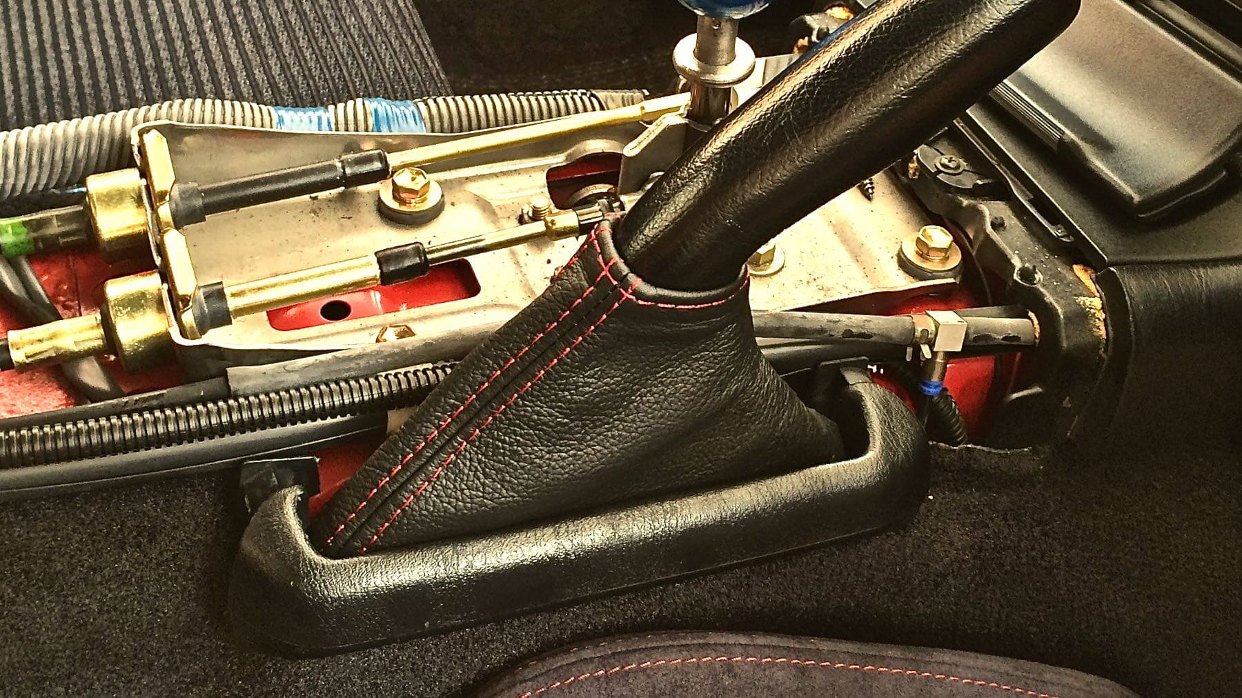 13 MR2 Shift boots and side brake black leather red stitch